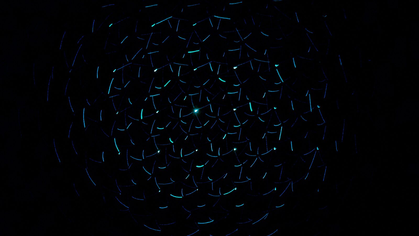 A sphere of accumulated points of light, long exposure